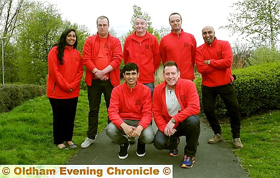 OLDHAM Carnival management group . . . (back, from left) Sonia Kumar, Paul Greaves, Martin Turner, Andy Nicholls and Anjum Raja. Front: Mushtakim Hussein and Paul Davies