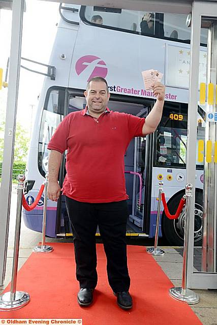 Sean Lloyd returns to drive a bus and hand out lottery tickets.