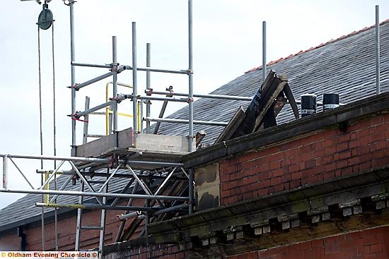 Work taking place on the roof at Royton swimming baths.
