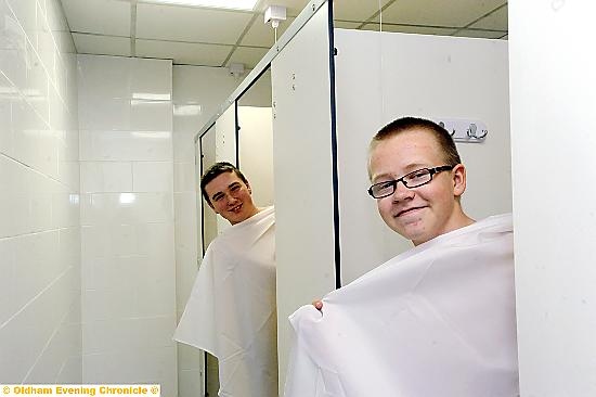 Cadets Tom Horan and Connor Knight take a shower in the new facilities