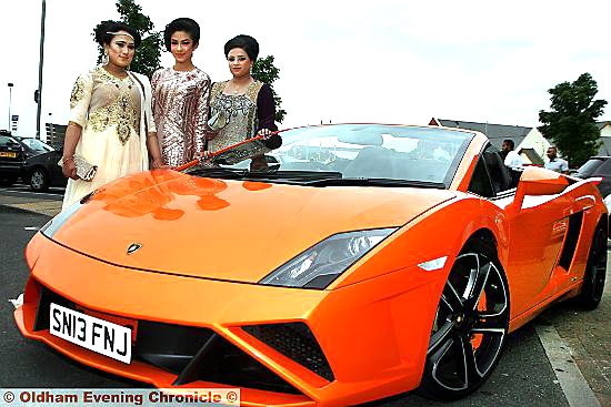 STYLISH (l-r): Jazin Khatun, Alisha Mahmood and Bushra Gul pose with a Lamborghini