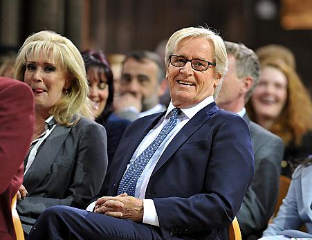 Actor William Roache smiles during a lighter moment of the service