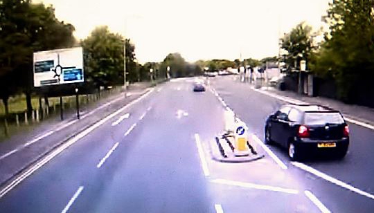 RECKLESS... the car speeds into the wrong lane to overtake
