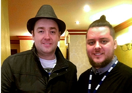 Travis's radio career has allowed him to meet stars such as comedian Jason Manford (left)