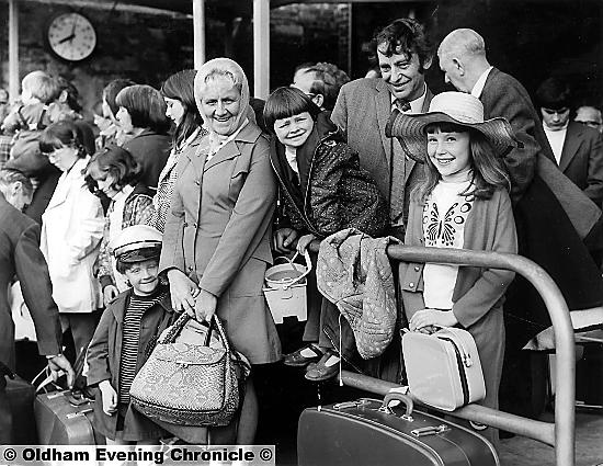 UP early and off . . . it’s a morning start for these Oldham trippers in 1974