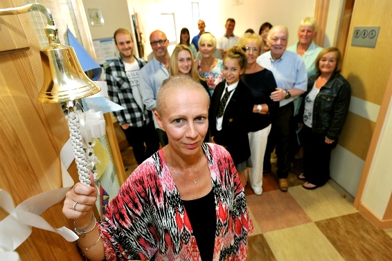 PARTING gift . . . Beverley Eagleton donates a bell to The Christie at Oldham for future patients