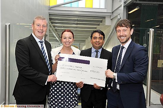 HOSPICE HELP... (from the left): Steve Kilroy, Oldham Business Awards steering group chairman, Angela Higham, from Dr Kershaw's, and steering group members Kashif Ashraf and Adam Husband