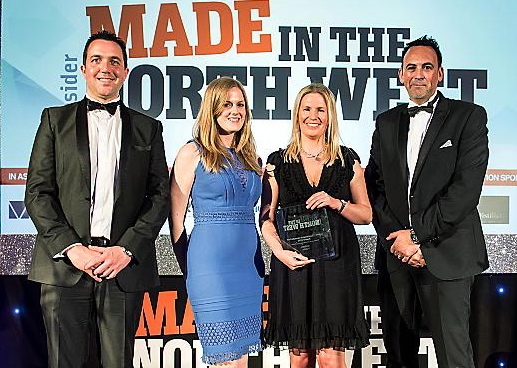 Polyflor marketing manager Tom Rollo, market manager Sonia Petherbridge, PR and communications manager Kerry Edward and manufacturing director Steve Mullholland receive the award from Insider magazine.
