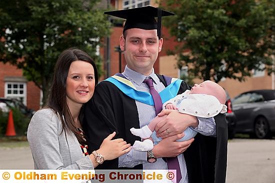 PROUD family . . . Joel Brayford with wife Emma and son Jenson