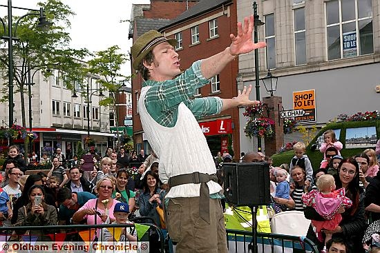 TV gardener Mr Bloom, entertains a packed crowd in Oldham town centre. 