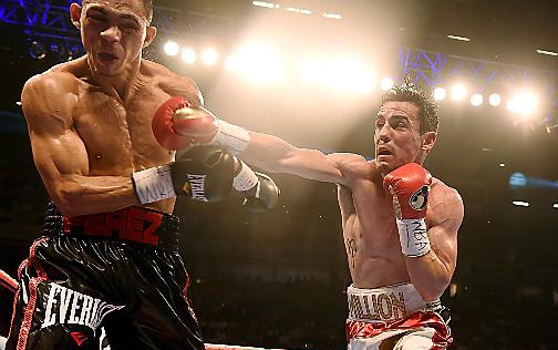 REACH OUT . . . Anthony Crolla lands a right hand against Darleys Perez during their controversial WBA world-lightweight title contest. 