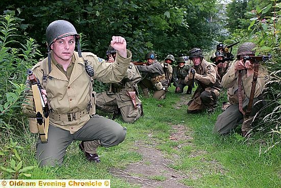 MILITARY re-enactors pose as American paratroopers during the 1944 Allied advance into France. Pictures by PAUL STERRITT
