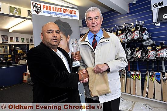 DOWN TO BUSINESS: Mohammed Naveed of Pro Elite Sports and Eddie Bayliss, the Saddleworth League chairman, conduct the draw for Twenty20 finals day.