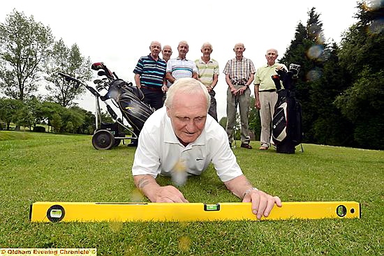 THAT’S THE SPIRIT . . . Oldham captain Steve Mills checks out a fairway, watched by, from the left, fellow club members Keith Cowell, Ray Buckley, Bill Broomhead, John Billington, Mike Dunkerley, Jack Simpson.
