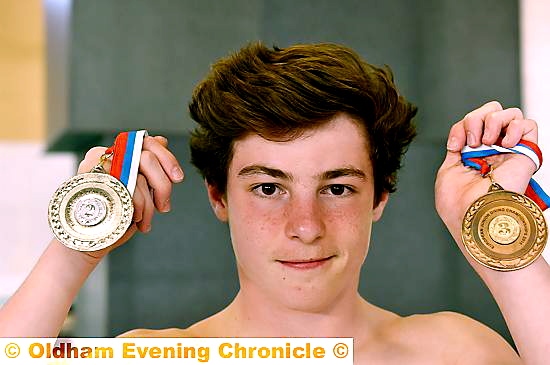SO PROUD . . . Anthony Harding shows off his European championship medals.
