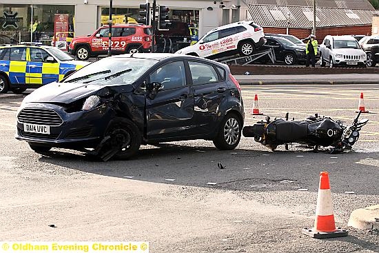 Drama: a motorbike and car collided