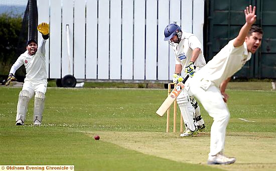 CLOSE SHAVE: Austerlands’ Andy Young, who made 42, survives an lbw appeal against Wythenshawe. Picture by TIM BRADLEY.