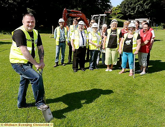 DIGGING deep: Kenny Heaton cuts the ground at the new play area.