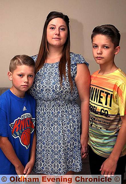Nicola Marshallsea, who tried to rescue the sheep, pictured with her sons Kieran (left) and Elliot