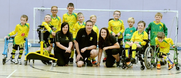 Ann, Jason and Hannah with youngsters from Chadderton Park FC’s cerebral palsy football club