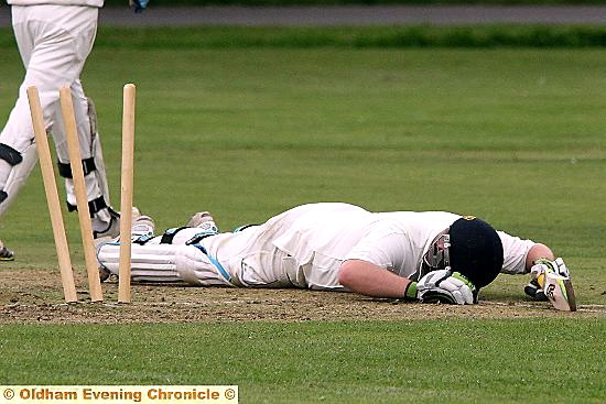 DOWN AND OUT: Alex Peters can’t believe being run out for 55 in the Inter-League final against the Lancashire County League at Well-i-Hole. The Greenfield batsman returns to the ground on Sunday for 2015 Tanner Cup final. 