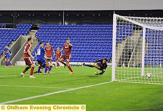 CONSOLATION . . . Danny Philliskirk (partly hidden) grabs a late goal for Athletic.