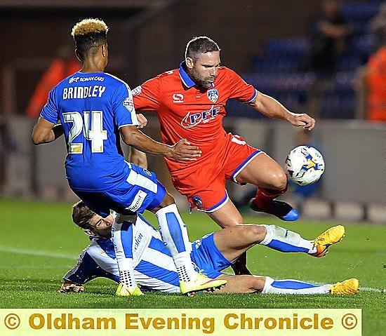 IT TAKES TWO: to stop Athletic substitute David Dunn following his second-half introduction to the game. All pictures: Alan Howarth. 