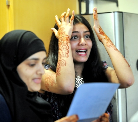 An elated Sharmin Ahmed and her equally-successful friend Humayra Begum gets their results at The Radclyffe School