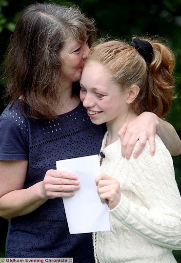 Emma Hall gets a “well-done” kiss from mum Lucy