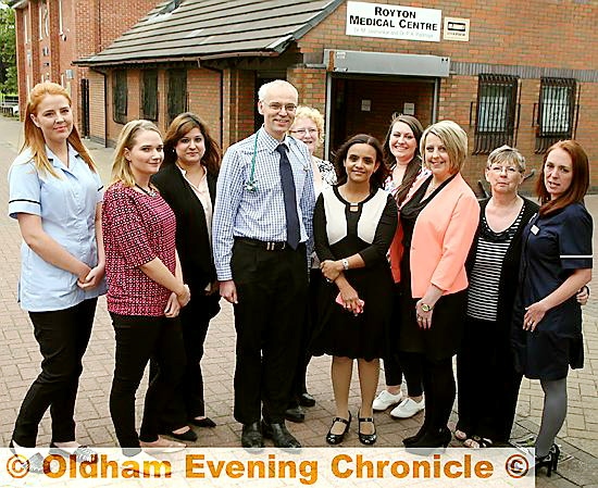 TOP docs . . . Dr Murray Stewart, Dr Ruchi Kulshrestha (centre) and practice manager Sharon Smith (third right) with other staff members