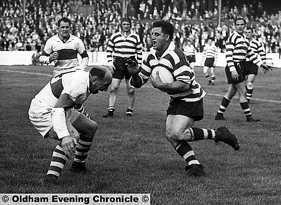 A rampaging Derek Turner in action against Workington in 1958.