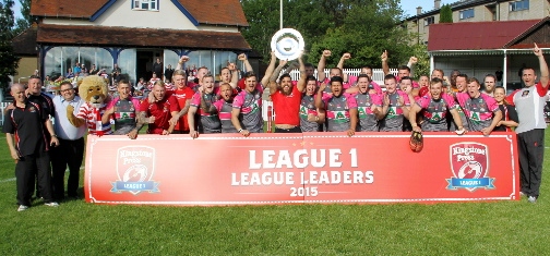 TEAM AND TROPHY: Triumphant Roughyeds lead the league