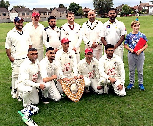 champions!: Friarmere seconds pose with the Division Two shield after victory over South West Manchester.