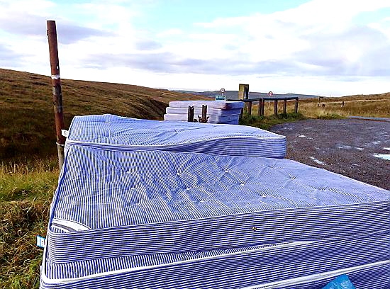 Mattresses dumped in a layby at Denshaw