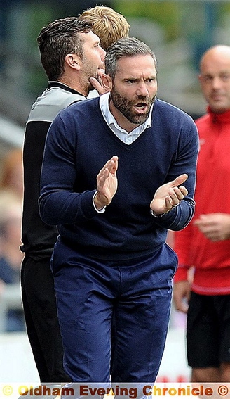 ANIMATED . . . David Dunn gets involved on the touchline