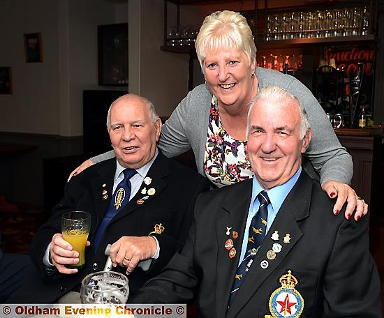 Royal Air Force Association welfare officer Muriel Simpson with members Ray Fiddes (left) and Lawrence Hay.