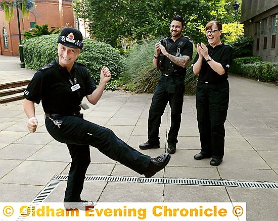 DANCING cop . . . Inspector Jacqui Prest with colleagues PC Aaron Palmer and PC Gill Collins
