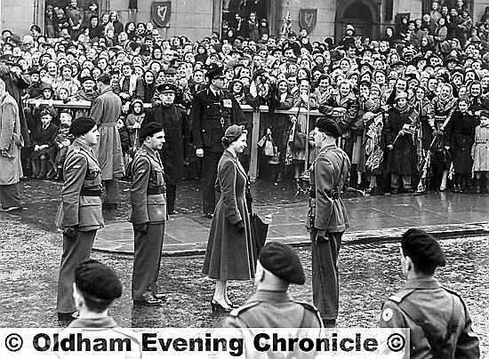 OLDHAM town centre packed with wellwishers on a rainy day in 1954