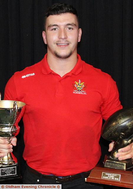 PRIZE GUY . . . Liam Thompson with the coaches' player and players' player of the year trophies
