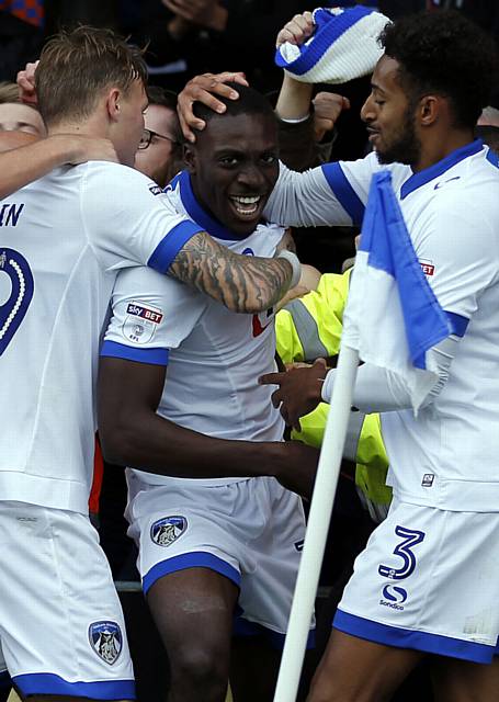Freddie Ladapo (C) is mobbed after his goal for Oldham during the League One game between Gillingham and Oldham Athletic at the KRBS Priestfield Stadium, Gillingham, on Sat Oct 8, 2016