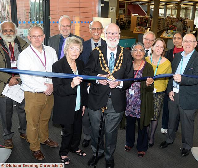 OPENING Health Awareness Day at Oldham Library is the mayor of Oldham Cllr Derek Heffernan