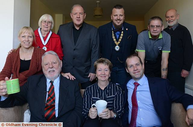 TERRY Waite, front left, opens new rooms at Emmaus. Back, from left, Alison Hall (director Emmaus Mossley), Irene Raddings (Mayoress of Mossley), actor John Henshaw, Councillor Greg Brett (Mayor of Mossley), Darren Phillips (companion), Richard Darlington (president Emmaus Mossley). Front, Terry Waite, Frances Hirst (Emmaus Mossley chairman of trustees), and Jonathan Reynolds MP