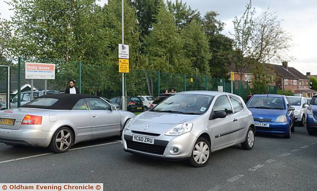 PARKING problems 

. . . outside Bare Trees Primary School