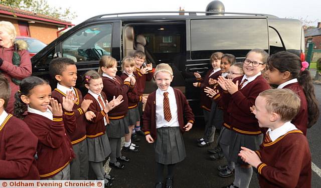 Ss Aidan and Oswald pupil Louise Goulden arrives at school in luxury and is greeted by her friends.