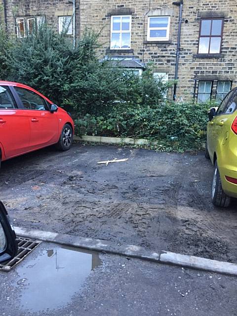 Sara Orritt branded the car parking bays a mud swamp. Picture shows one of the spaces in at the Bakestones project September 2016.
