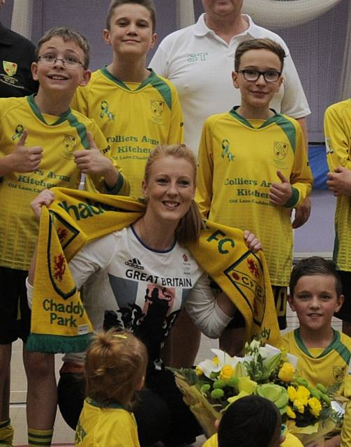 Oldham's Olympic gold medallist Nicola White with children from Chadderton Park Sports Club Cerebral Palsy team.