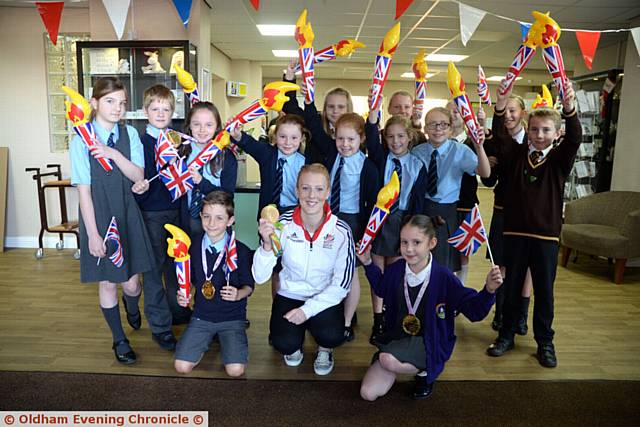 Olympic Gold Medalist Nicola White visits Dr Kershaw's Hospice, Oldham. Pictured here with children from local schools who came to welcome her.
