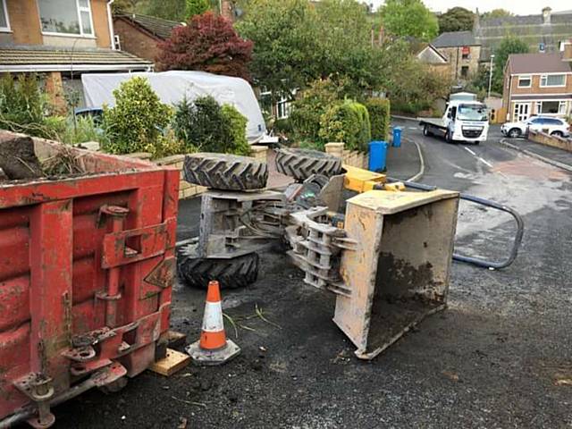 A 60-year-old man was trapped underneath the digger in Primrose Avenue, Uppermill