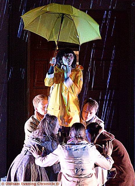 SINGING in the rain . . . the launch show
