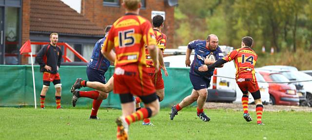 GIVING IT HIS ALL . . . ball in hand, Oldham's Bobby Cullen makes a break. PICS by TIM ABRAM